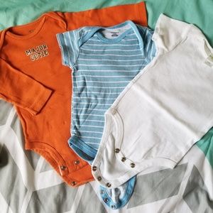 3/$15 set of 3 bodysuits. Like new.